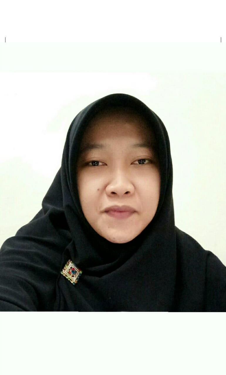 apt. Rahmayati Rusnedy, S.Farm, M.Si